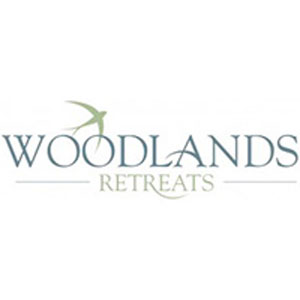 Woodlands Retreats logo Woodlands Retreats logo